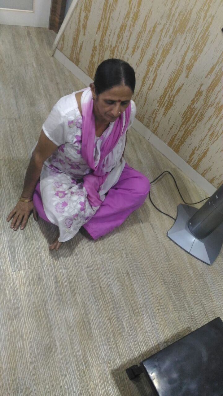 patient sitting on floor